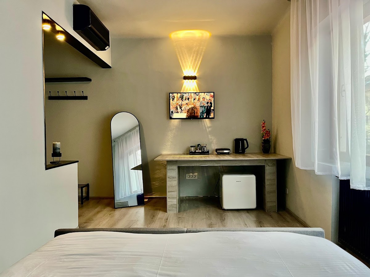 Photo de Cozy Hideout - Condo Hotel